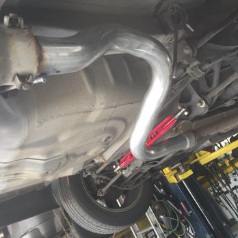 Custom muffler installation for a secure exhaust system fit
